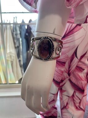 Sterling Silver Cuff Bracelet with Purple Oval Gem